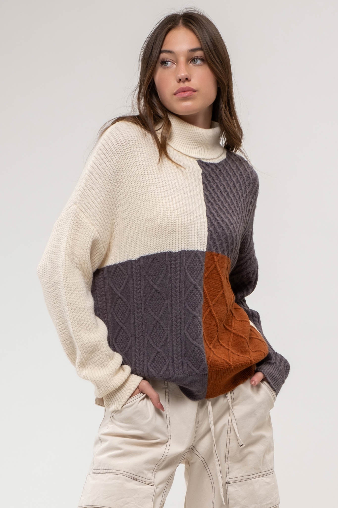 COLORBLOCK CABLE KNIT SWEATER
