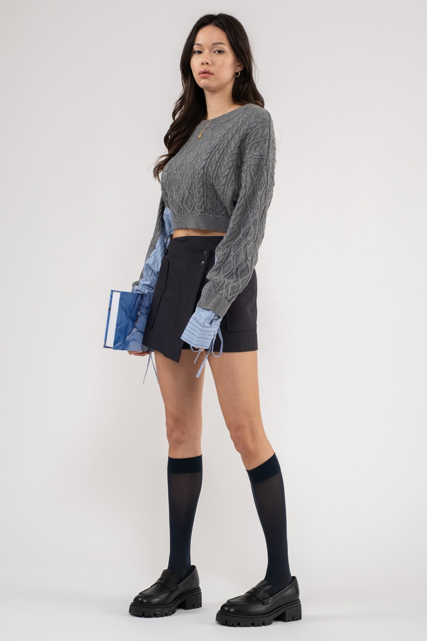 CONTRAST SLEEVE CABLE KNIT SWEATER