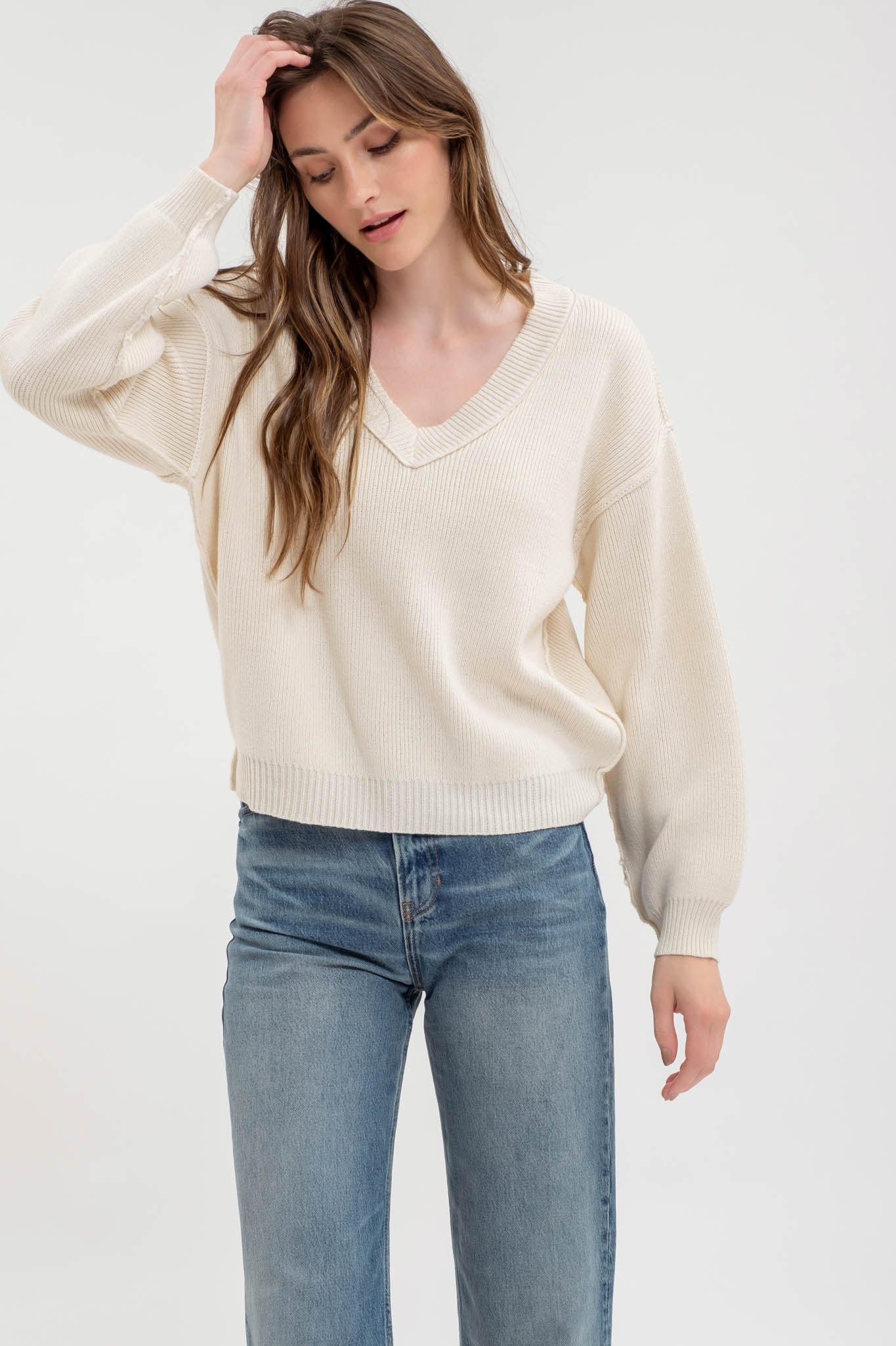 EXPOSED SEAM V NECK PULLOVER KNIT SWEATER