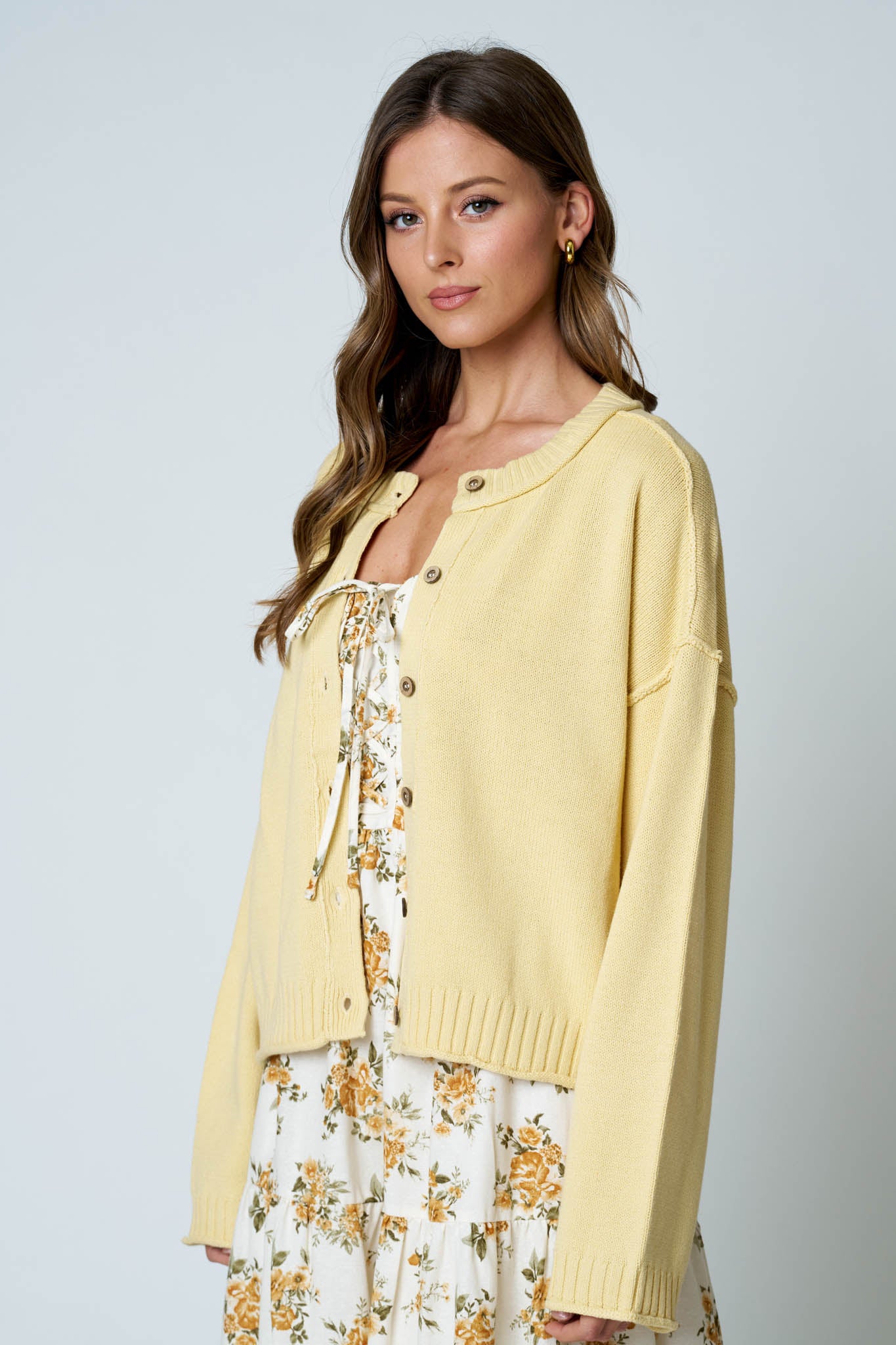 RAW EDGE EXPOSED SEAM BUTTON DOWN KNIT CARDIGAN