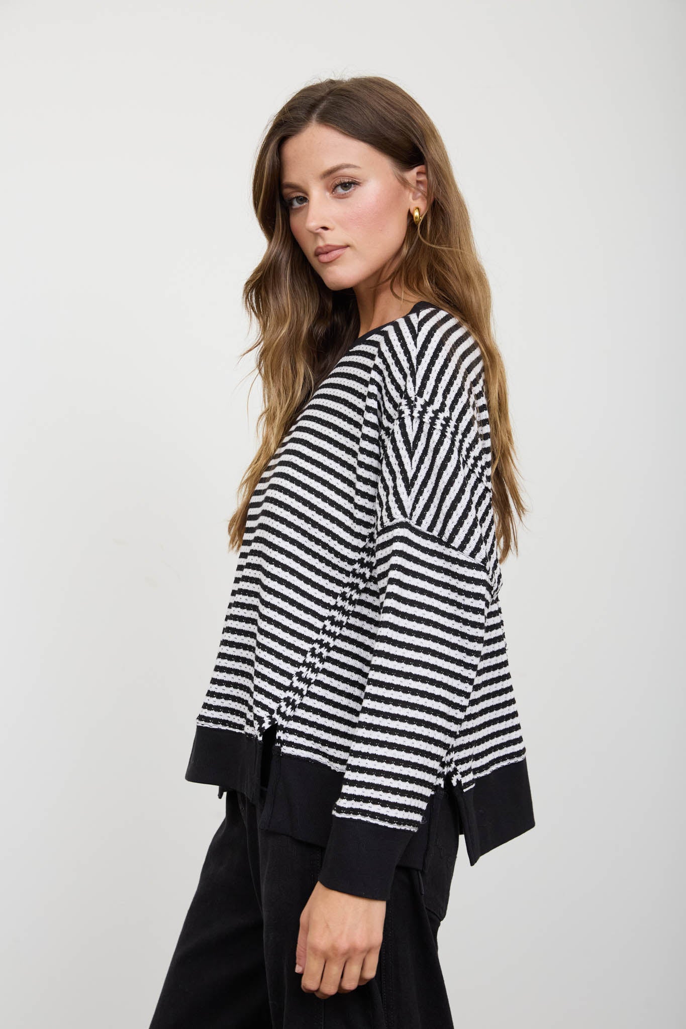 STRIPE EXPOSED SEAM SPLIT HEM LONG SLEEVE KNIT TOP (PRE-ORDER)