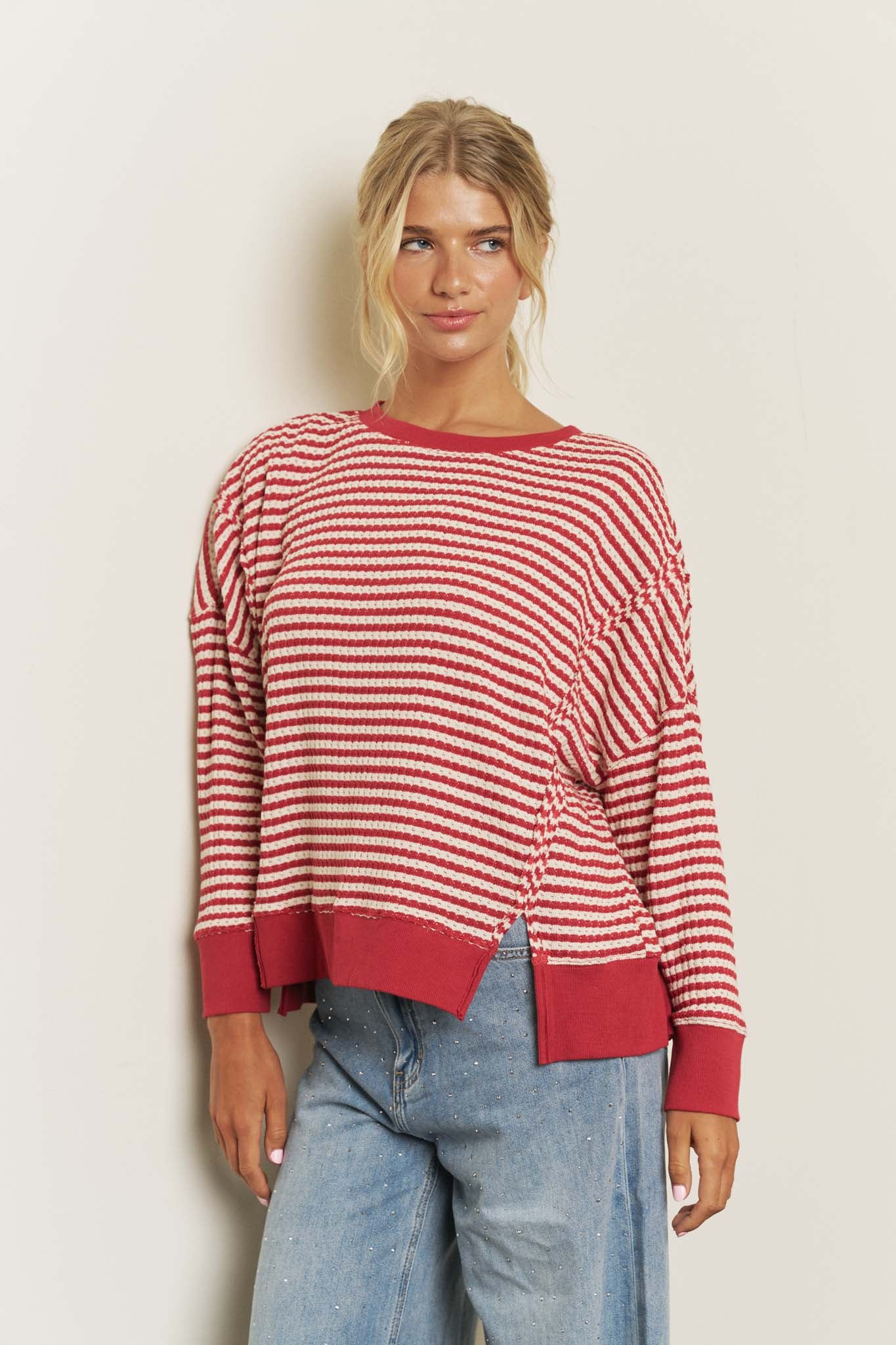 STRIPE EXPOSED SEAM SPLIT HEM LONG SLEEVE KNIT TOP (PRE-ORDER)