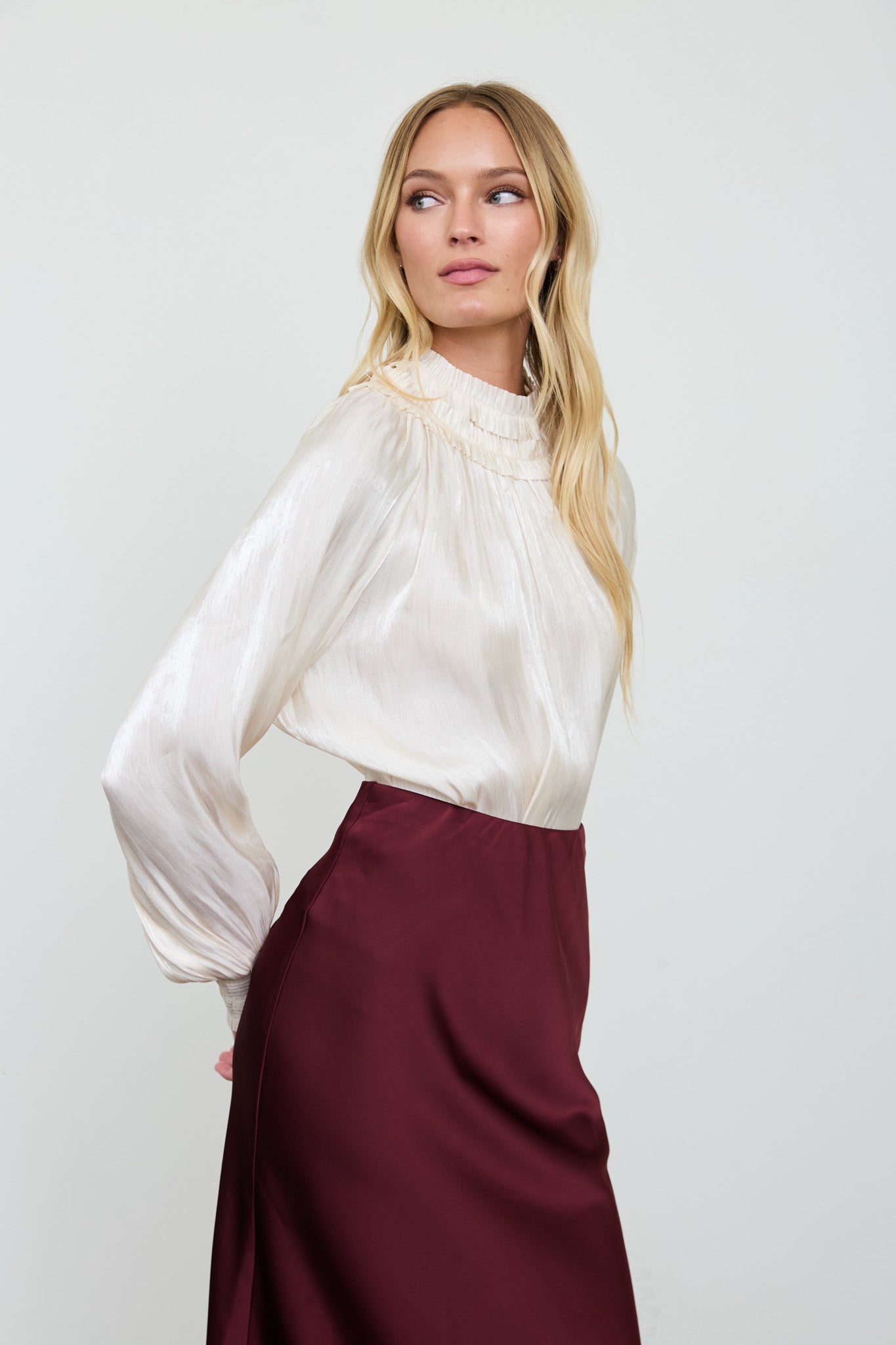 SMOCKED NECK SHIMMER LONG SLEEVE BLOUSE