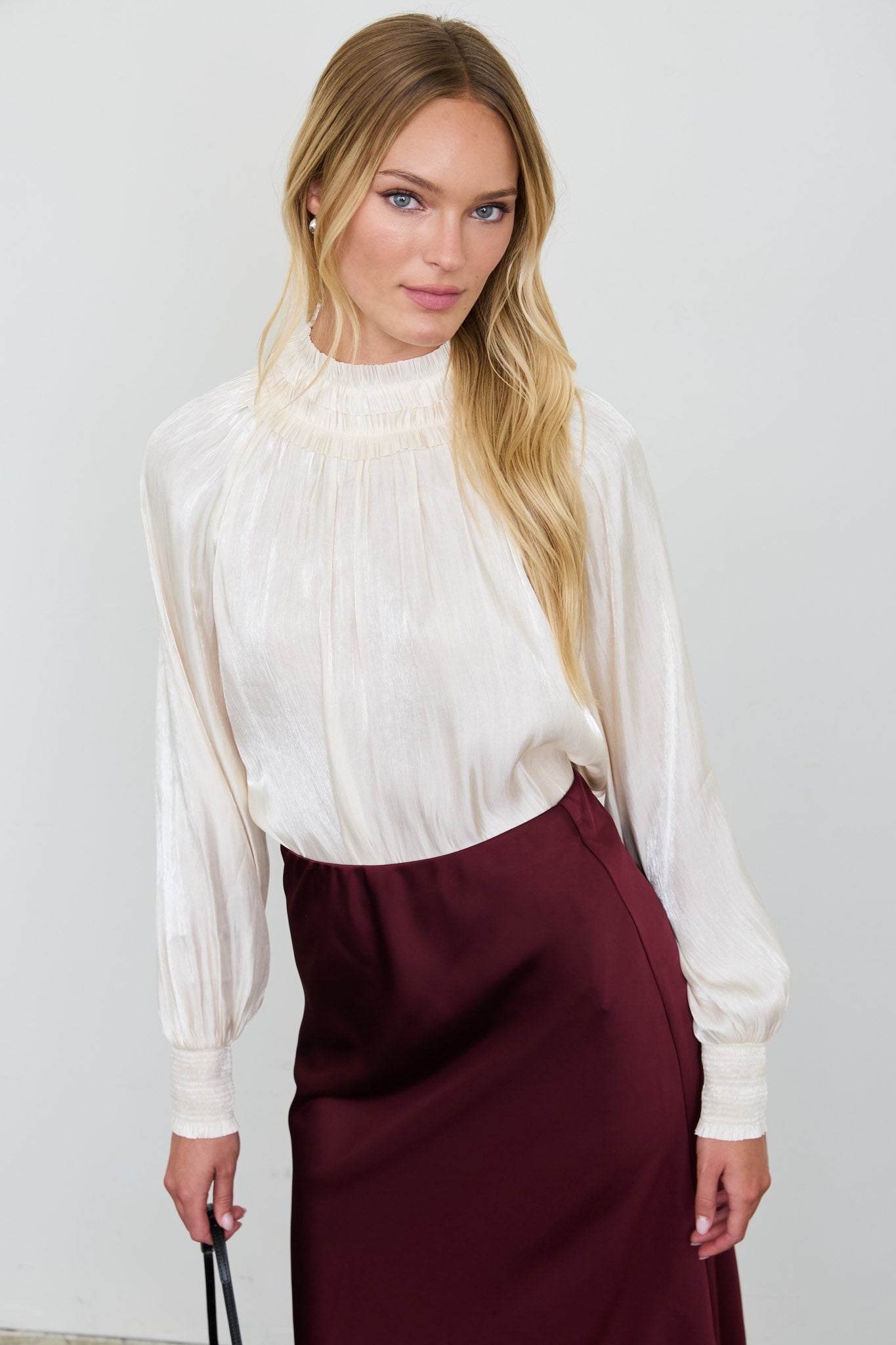 SMOCKED NECK SHIMMER LONG SLEEVE BLOUSE