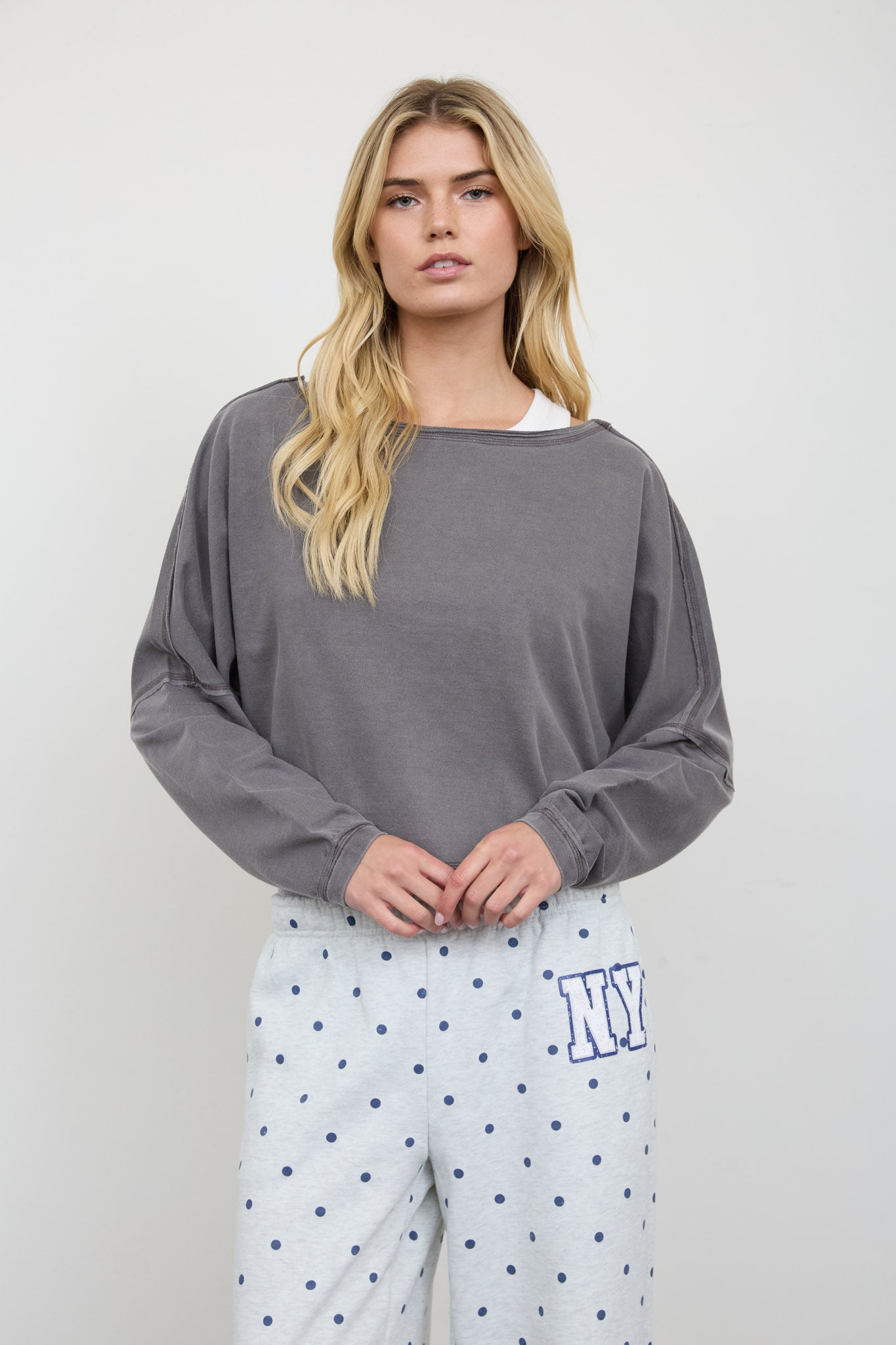 BOAT NECK RAW EDGE LONG SLEEVE CROPPED KNIT TOP