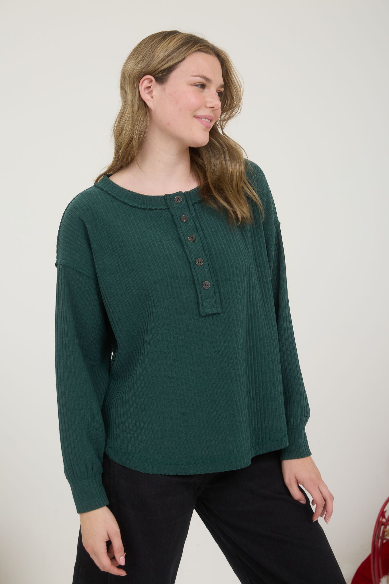 RIBBED HENLEY LONG SLEEVE EXPOSED SEAM KNIT TOP
