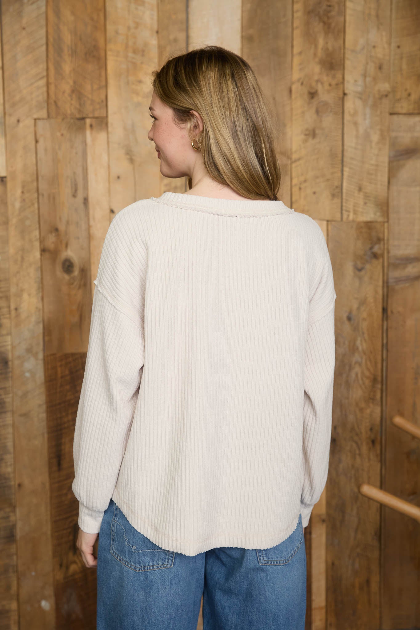 RIBBED HENLEY LONG SLEEVE EXPOSED SEAM KNIT TOP