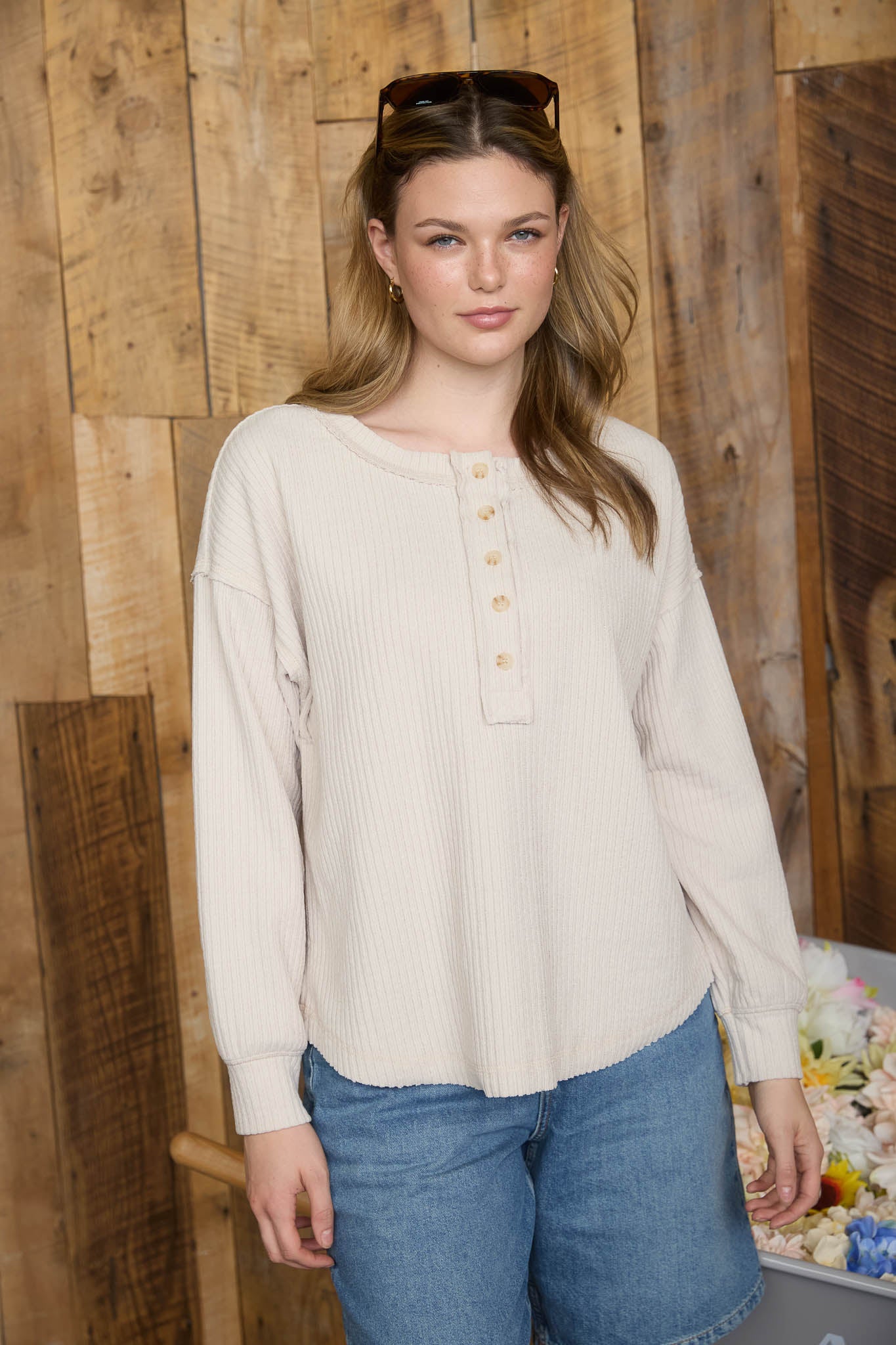 RIBBED HENLEY LONG SLEEVE EXPOSED SEAM KNIT TOP