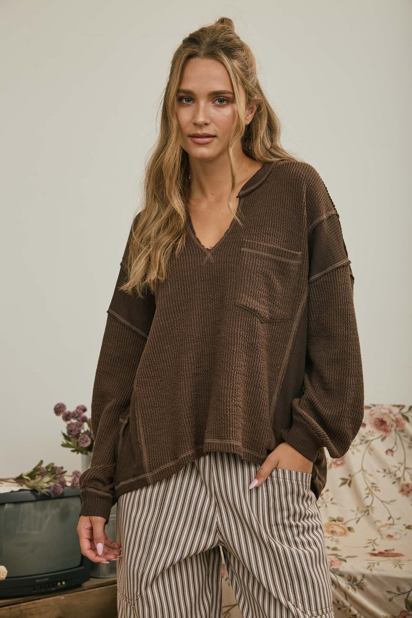 SPLIT NECK RAW EDGE LONG SLEEVE RIBBED KNIT TOP (PRE-ORDER)