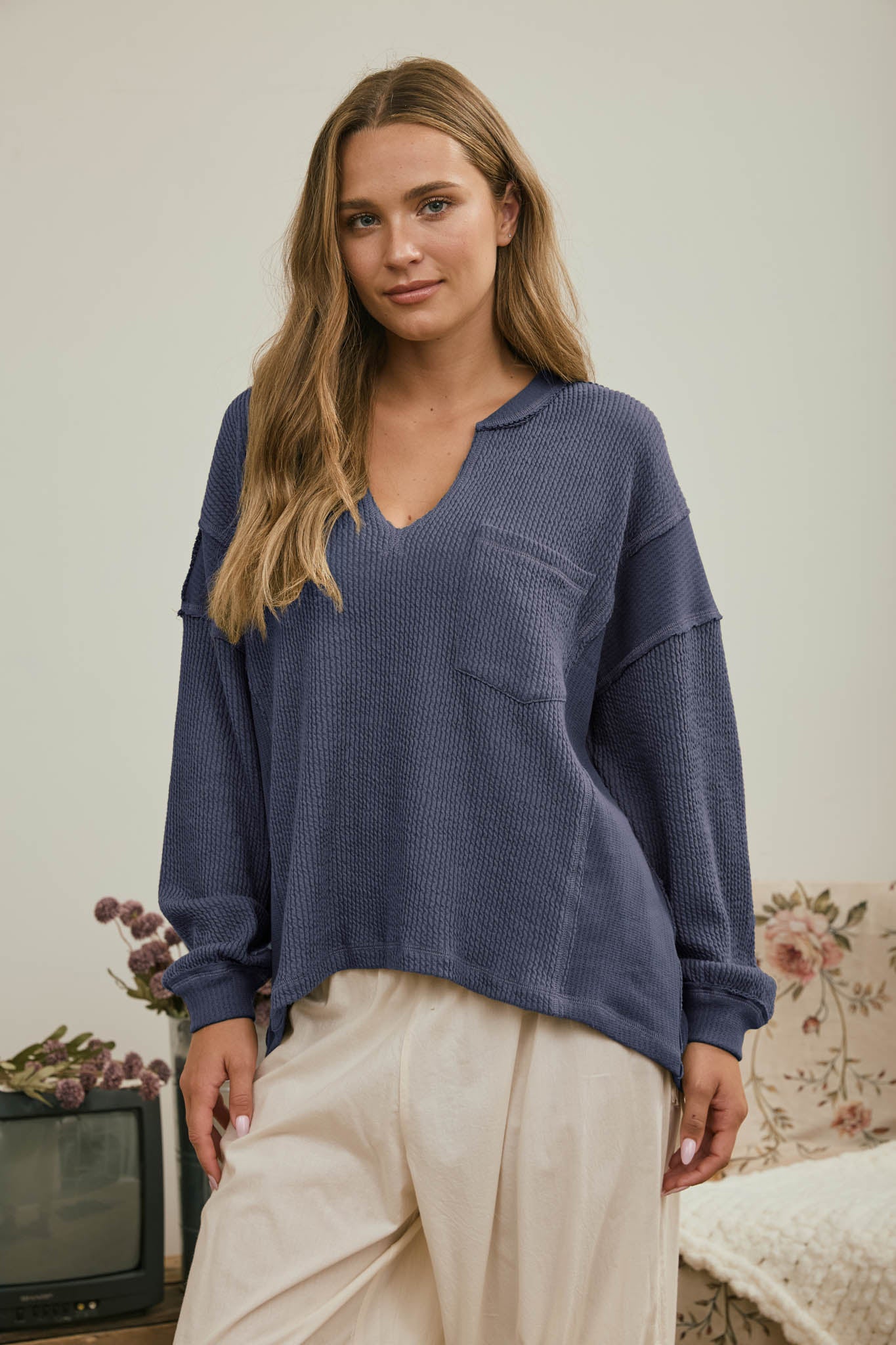 SPLIT NECK RAW EDGE LONG SLEEVE RIBBED KNIT TOP (PRE-ORDER)