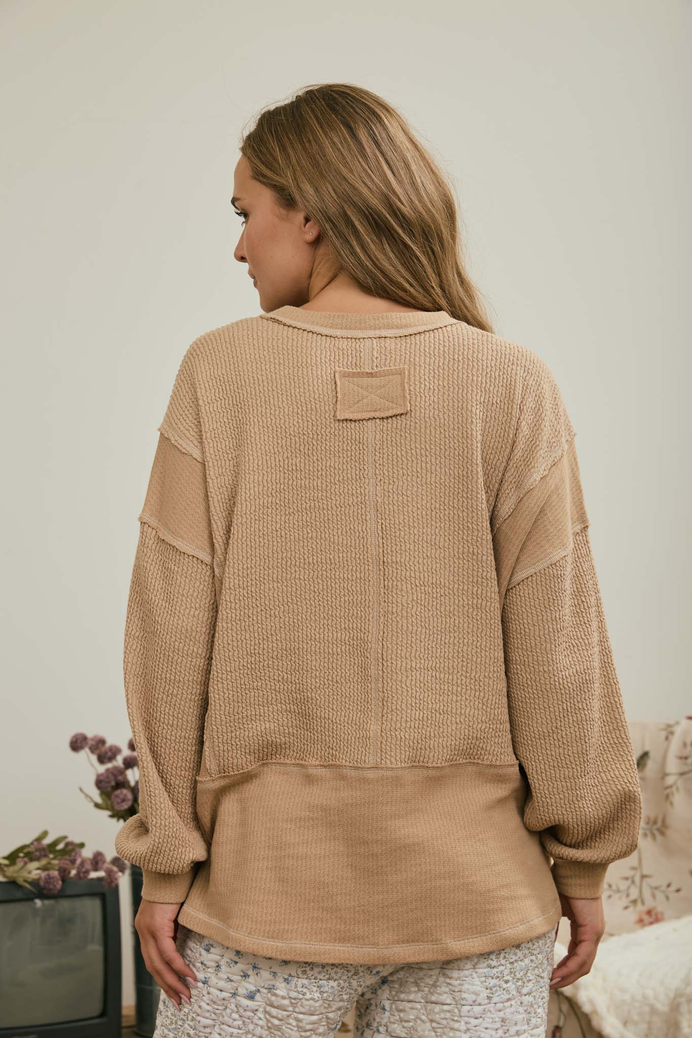 SPLIT NECK RAW EDGE LONG SLEEVE RIBBED KNIT TOP (PRE-ORDER)