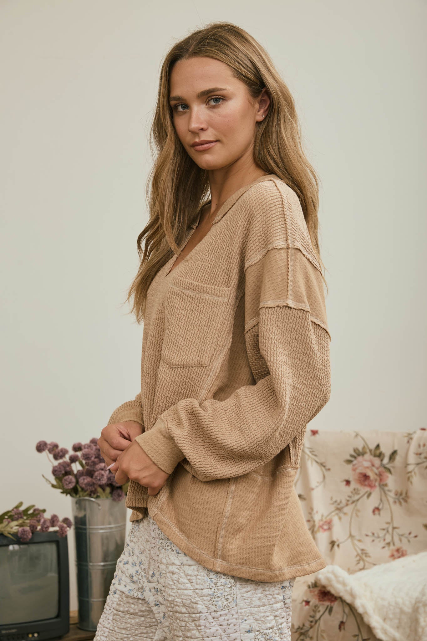 SPLIT NECK RAW EDGE LONG SLEEVE RIBBED KNIT TOP (PRE-ORDER)