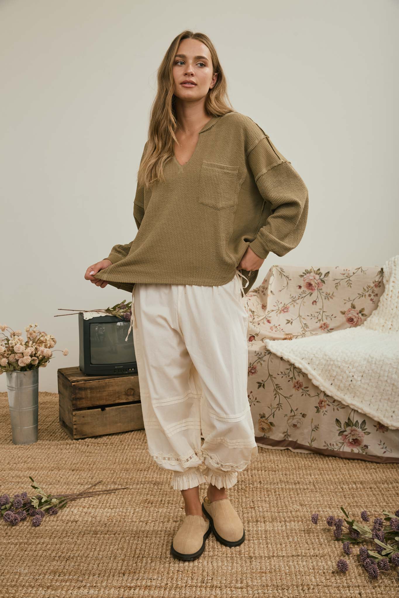 SPLIT NECK RAW EDGE LONG SLEEVE RIBBED KNIT TOP (PRE-ORDER)