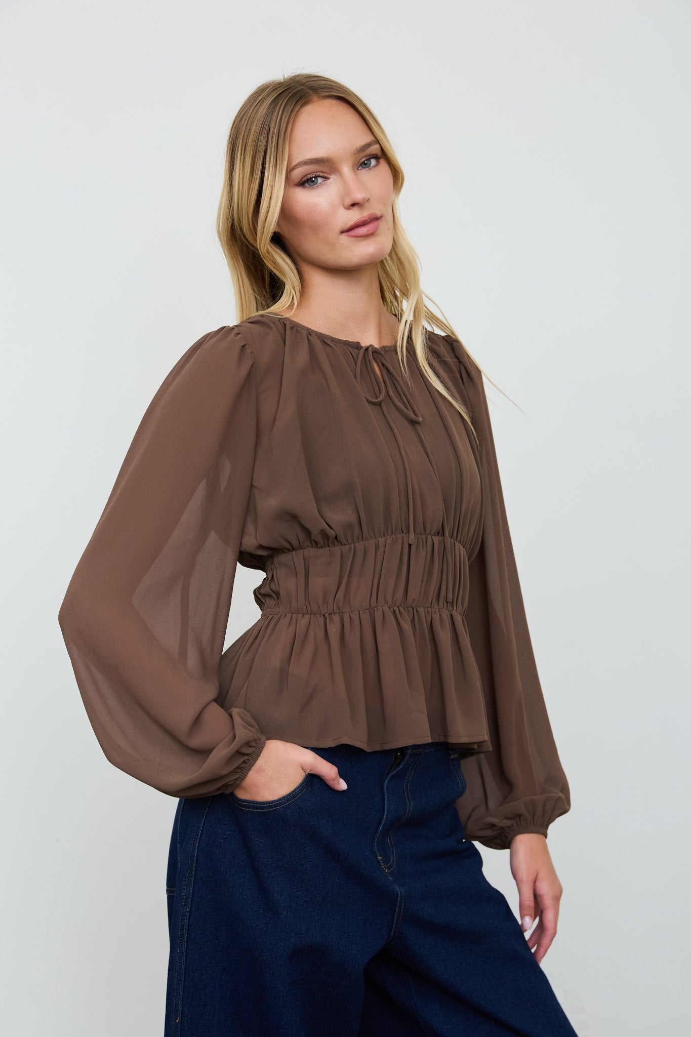 GATHERED TIE-NECK PEPLUM LONG SLEEVE TOP