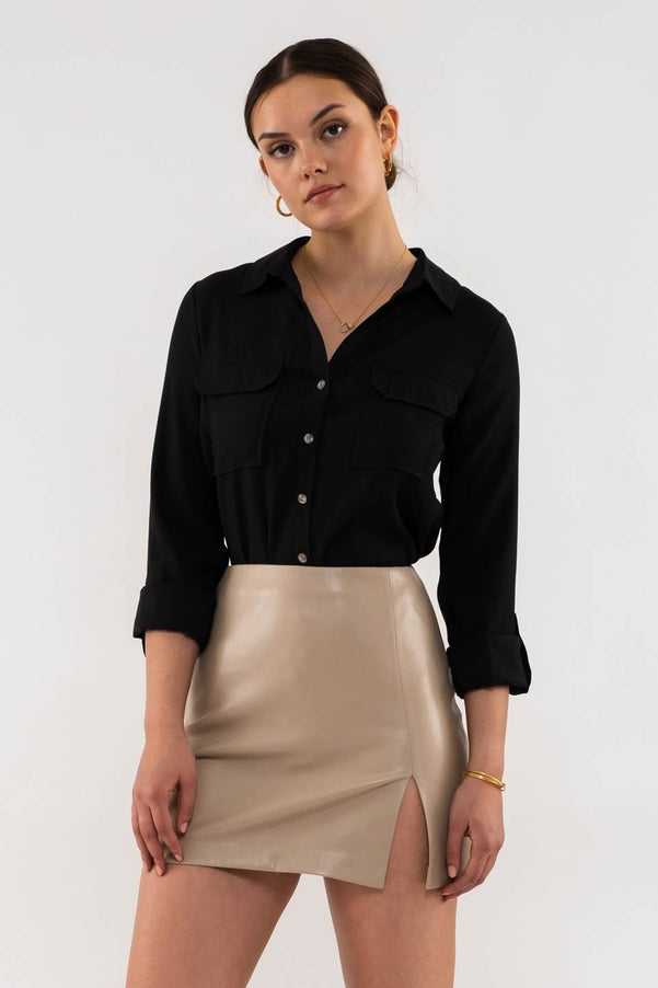 TOP TEJIDO CON CUELLO Y BOTONES