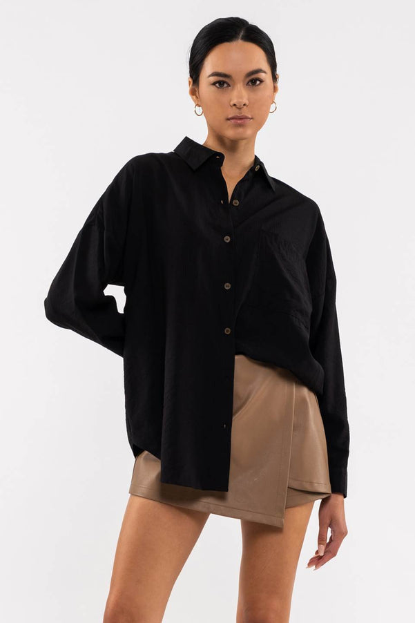 TOP DE MANGA LARGA CON CUELLO Y BOTONES